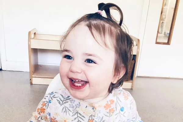 Happy child at Nurture Childcare Montessori nursery