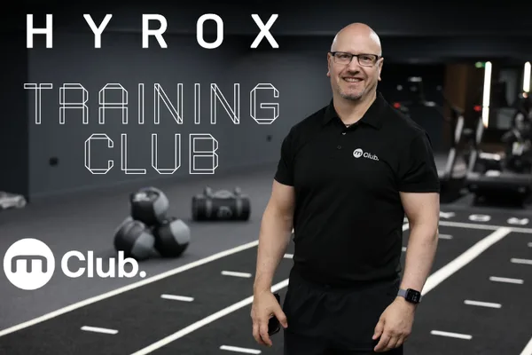 HYROX Training Club coach on the turf track at M Club, Stoke-on-Trent