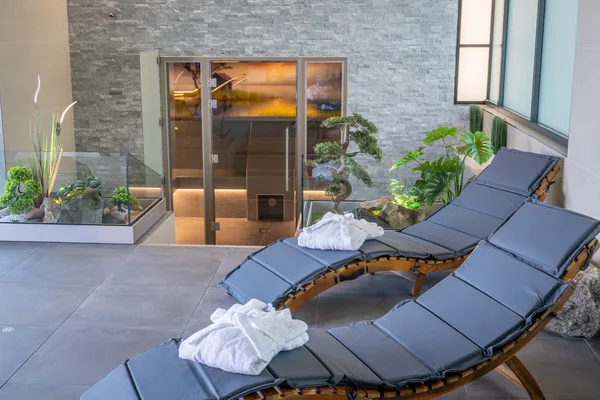 Loungers with sauna door view at M Spa Platinum